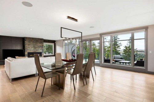 3508 Spruce Drive Sw, Calgary, AB - Indoor Photo Showing Dining Room With Fireplace