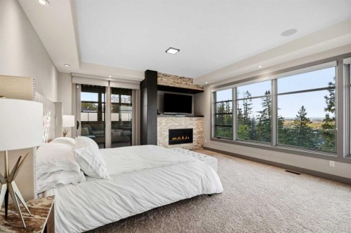 3508 Spruce Drive Sw, Calgary, AB - Indoor Photo Showing Bedroom With Fireplace