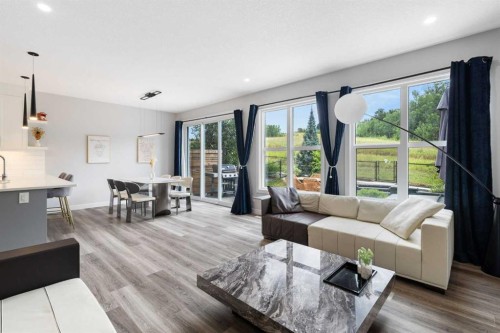 100 Crestbrook View Sw, Calgary, AB - Indoor Photo Showing Living Room
