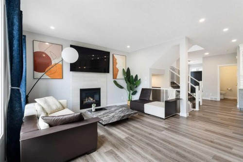 100 Crestbrook View Sw, Calgary, AB - Indoor Photo Showing Living Room With Fireplace