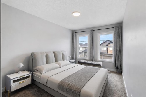 100 Crestbrook View Sw, Calgary, AB - Indoor Photo Showing Bedroom
