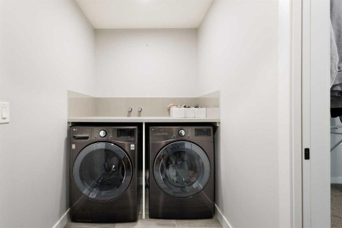 100 Crestbrook View Sw, Calgary, AB - Indoor Photo Showing Laundry Room