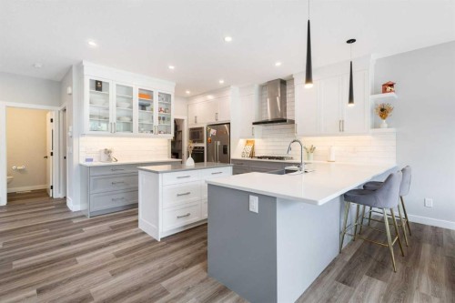 100 Crestbrook View Sw, Calgary, AB - Indoor Photo Showing Kitchen With Upgraded Kitchen
