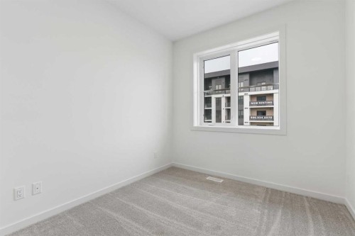 1475 Na'A Drive Sw, Calgary, AB - Indoor Photo Showing Other Room