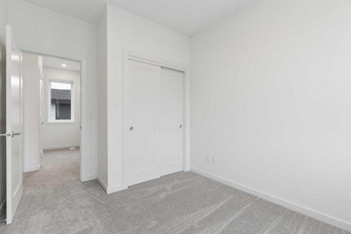 1475 Na'A Drive Sw, Calgary, AB - Indoor Photo Showing Other Room