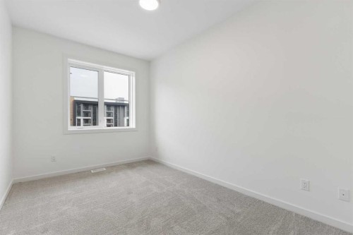 1475 Na'A Drive Sw, Calgary, AB - Indoor Photo Showing Other Room