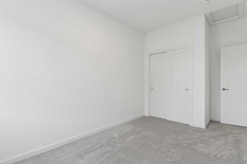 1475 Na'A Drive Sw, Calgary, AB - Indoor Photo Showing Other Room