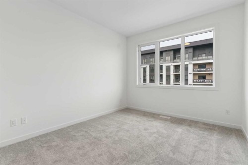 1475 Na'A Drive Sw, Calgary, AB - Indoor Photo Showing Other Room