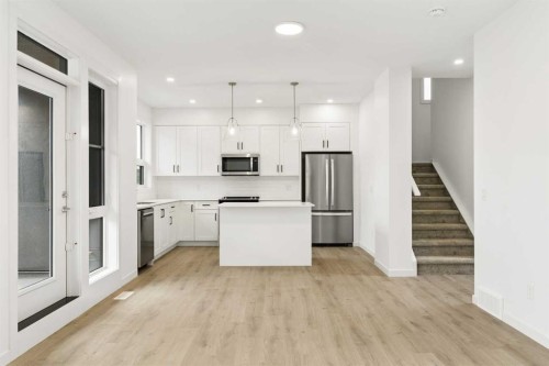 1475 Na'A Drive Sw, Calgary, AB - Indoor Photo Showing Kitchen With Upgraded Kitchen