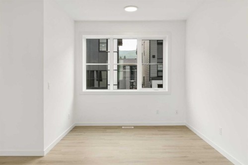 1475 Na'A Drive Sw, Calgary, AB - Indoor Photo Showing Other Room