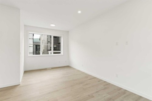 1475 Na'A Drive Sw, Calgary, AB - Indoor Photo Showing Other Room