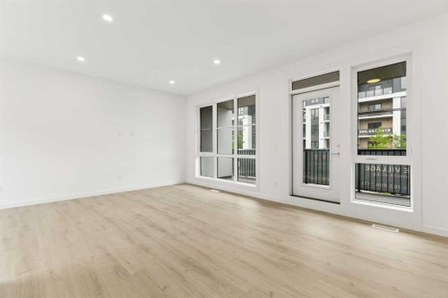 1475 Na'A Drive Sw, Calgary, AB - Indoor Photo Showing Other Room
