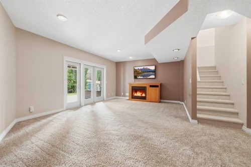 68 Auburn Sound Terrace Se, Calgary, AB - Indoor With Fireplace