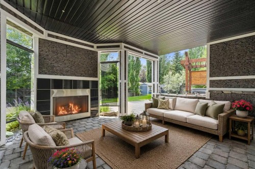 68 Auburn Sound Terrace Se, Calgary, AB - Outdoor With Fireplace With Deck Patio Veranda With Exterior