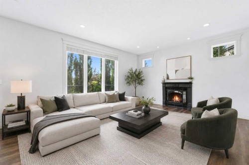 68 Auburn Sound Terrace Se, Calgary, AB - Indoor Photo Showing Living Room With Fireplace