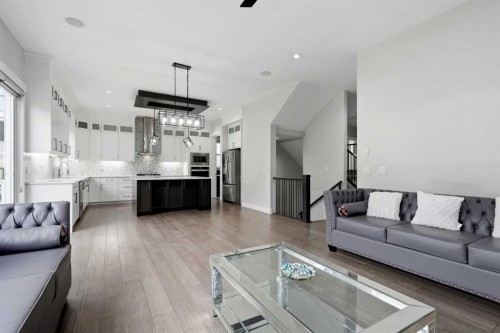 111 Kinniburgh Place, Chestermere, AB - Indoor Photo Showing Living Room