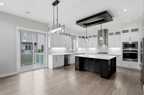 111 Kinniburgh Place, Chestermere, AB - Indoor Photo Showing Kitchen With Upgraded Kitchen