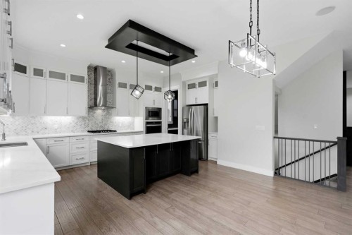 111 Kinniburgh Place, Chestermere, AB - Indoor Photo Showing Kitchen With Upgraded Kitchen