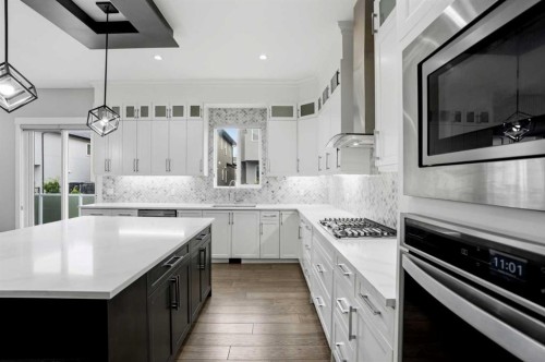 111 Kinniburgh Place, Chestermere, AB - Indoor Photo Showing Kitchen With Upgraded Kitchen