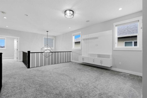 111 Kinniburgh Place, Chestermere, AB - Indoor Photo Showing Other Room
