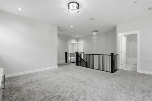 111 Kinniburgh Place, Chestermere, AB - Indoor Photo Showing Other Room