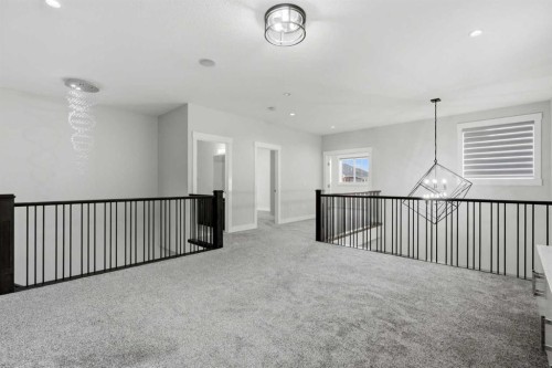 111 Kinniburgh Place, Chestermere, AB - Indoor Photo Showing Other Room