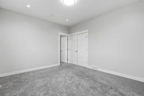 111 Kinniburgh Place, Chestermere, AB - Indoor Photo Showing Other Room