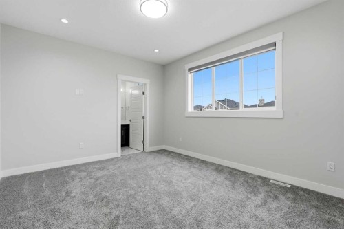 111 Kinniburgh Place, Chestermere, AB - Indoor Photo Showing Other Room