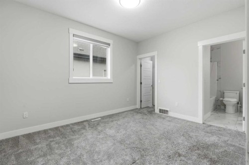 111 Kinniburgh Place, Chestermere, AB - Indoor Photo Showing Other Room