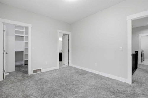 111 Kinniburgh Place, Chestermere, AB - Indoor Photo Showing Other Room