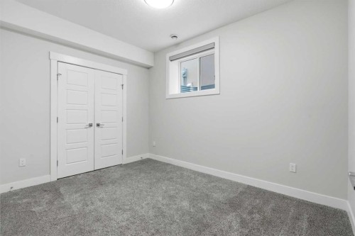 111 Kinniburgh Place, Chestermere, AB - Indoor Photo Showing Other Room