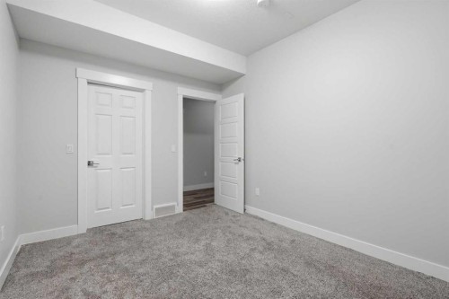 111 Kinniburgh Place, Chestermere, AB - Indoor Photo Showing Other Room