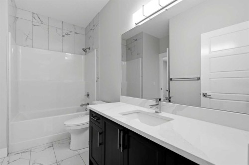 111 Kinniburgh Place, Chestermere, AB - Indoor Photo Showing Bathroom