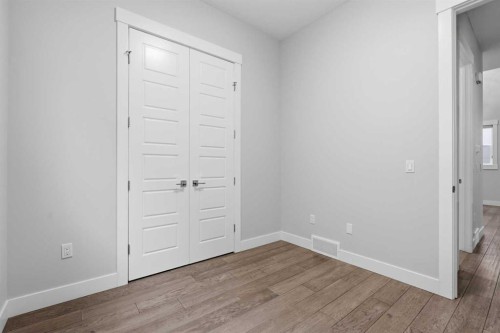 111 Kinniburgh Place, Chestermere, AB - Indoor Photo Showing Other Room