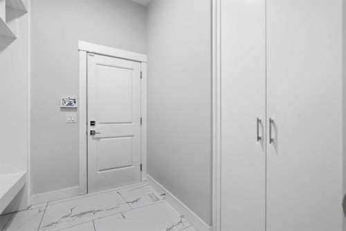 111 Kinniburgh Place, Chestermere, AB - Indoor Photo Showing Other Room