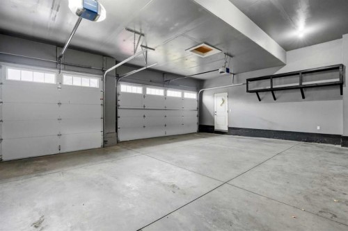 111 Kinniburgh Place, Chestermere, AB - Indoor Photo Showing Garage