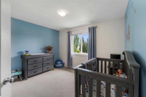 169 West Creek Boulevard, Chestermere, AB - Indoor Photo Showing Bedroom