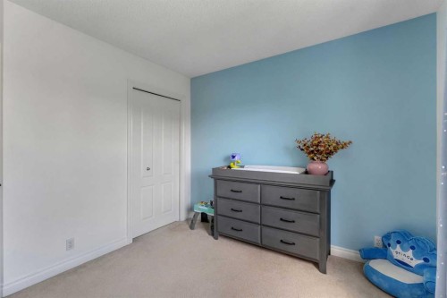 169 West Creek Boulevard, Chestermere, AB - Indoor Photo Showing Bedroom