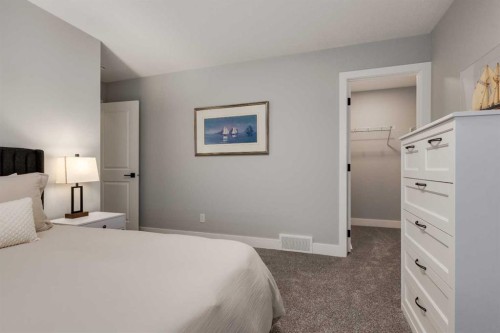 18 South Shore Bay, Chestermere, AB - Indoor Photo Showing Bedroom