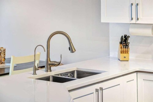 359 Mt Apex Green Se, Calgary, AB - Indoor Photo Showing Kitchen With Double Sink