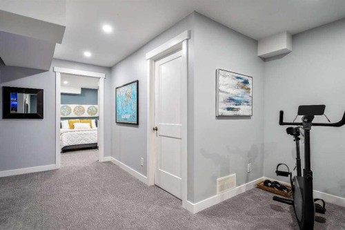 359 Mt Apex Green Se, Calgary, AB - Indoor Photo Showing Gym Room