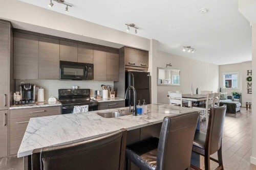 17 Stonehouse Crescent Nw, High River, AB - Indoor Photo Showing Kitchen