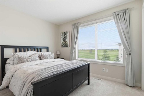 17 Stonehouse Crescent Nw, High River, AB - Indoor Photo Showing Bedroom