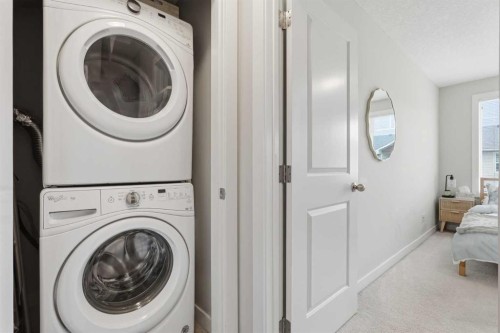 17 Stonehouse Crescent Nw, High River, AB - Indoor Photo Showing Laundry Room