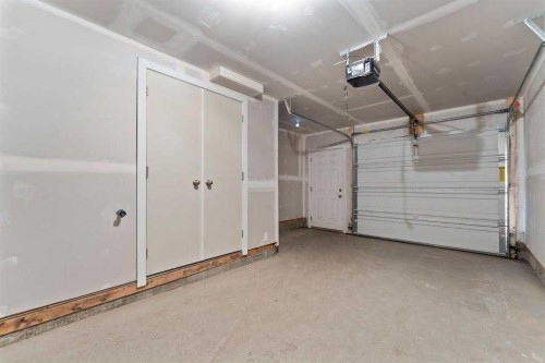 17 Stonehouse Crescent Nw, High River, AB - Indoor Photo Showing Garage
