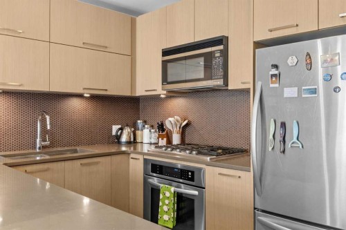 231-721 4 Street Ne, Calgary, AB - Indoor Photo Showing Kitchen With Upgraded Kitchen
