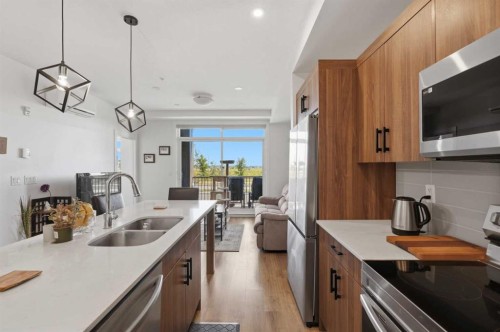 5112-200 Seton Circle Se, Calgary, AB - Indoor Photo Showing Kitchen With Double Sink With Upgraded Kitchen