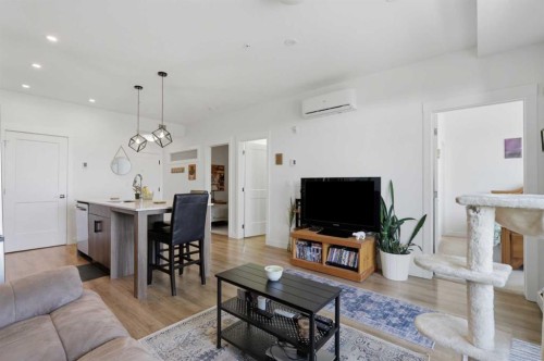 5112-200 Seton Circle Se, Calgary, AB - Indoor Photo Showing Living Room