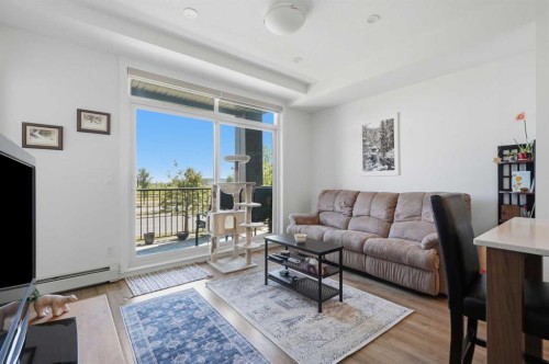 5112-200 Seton Circle Se, Calgary, AB - Indoor Photo Showing Living Room