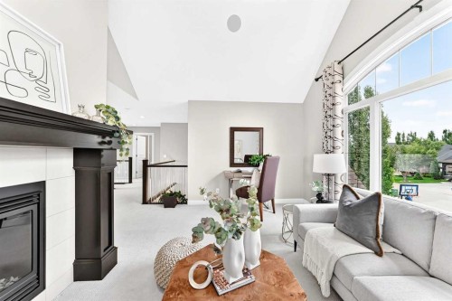 96 Cranarch Heights Se, Calgary, AB - Indoor Photo Showing Living Room With Fireplace
